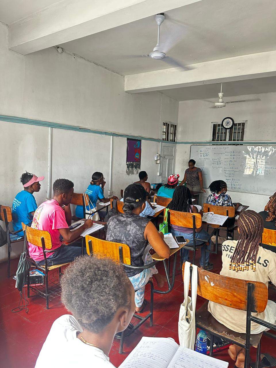 Students engaged in language learning classroom session